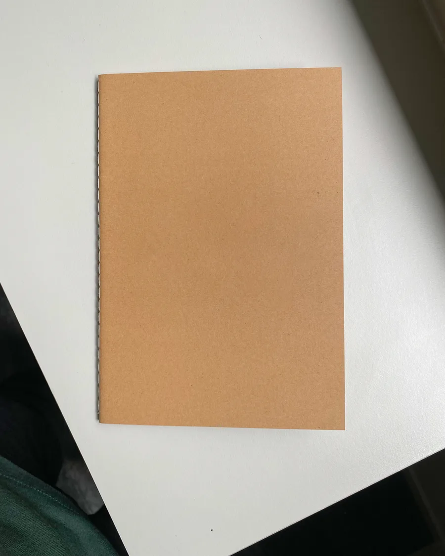 Carnet à couture apparente